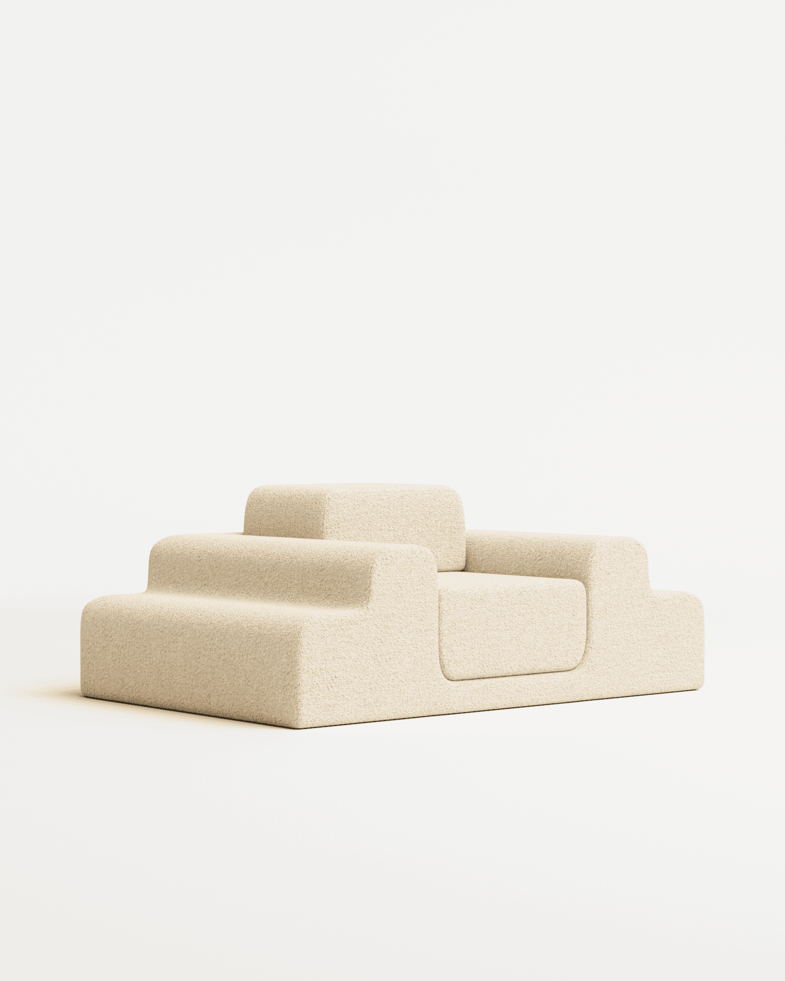 Médano lounge chair in bouclé by Estudio Persona, stepped modular form with integrated armrests in light beige bouclé