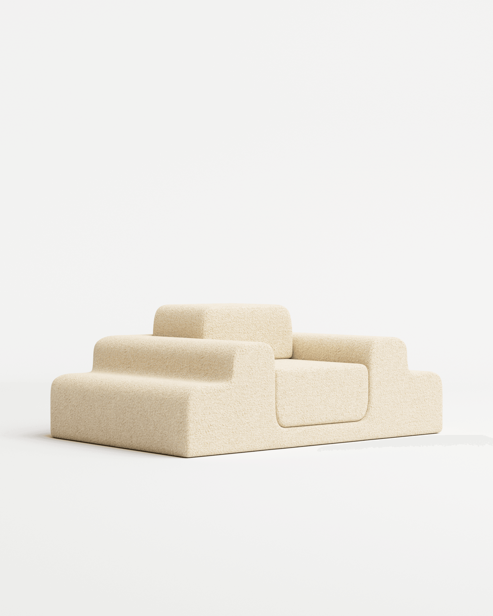 Médano lounge chair in bouclé by Estudio Persona, stepped modular form with integrated armrests in light beige bouclé