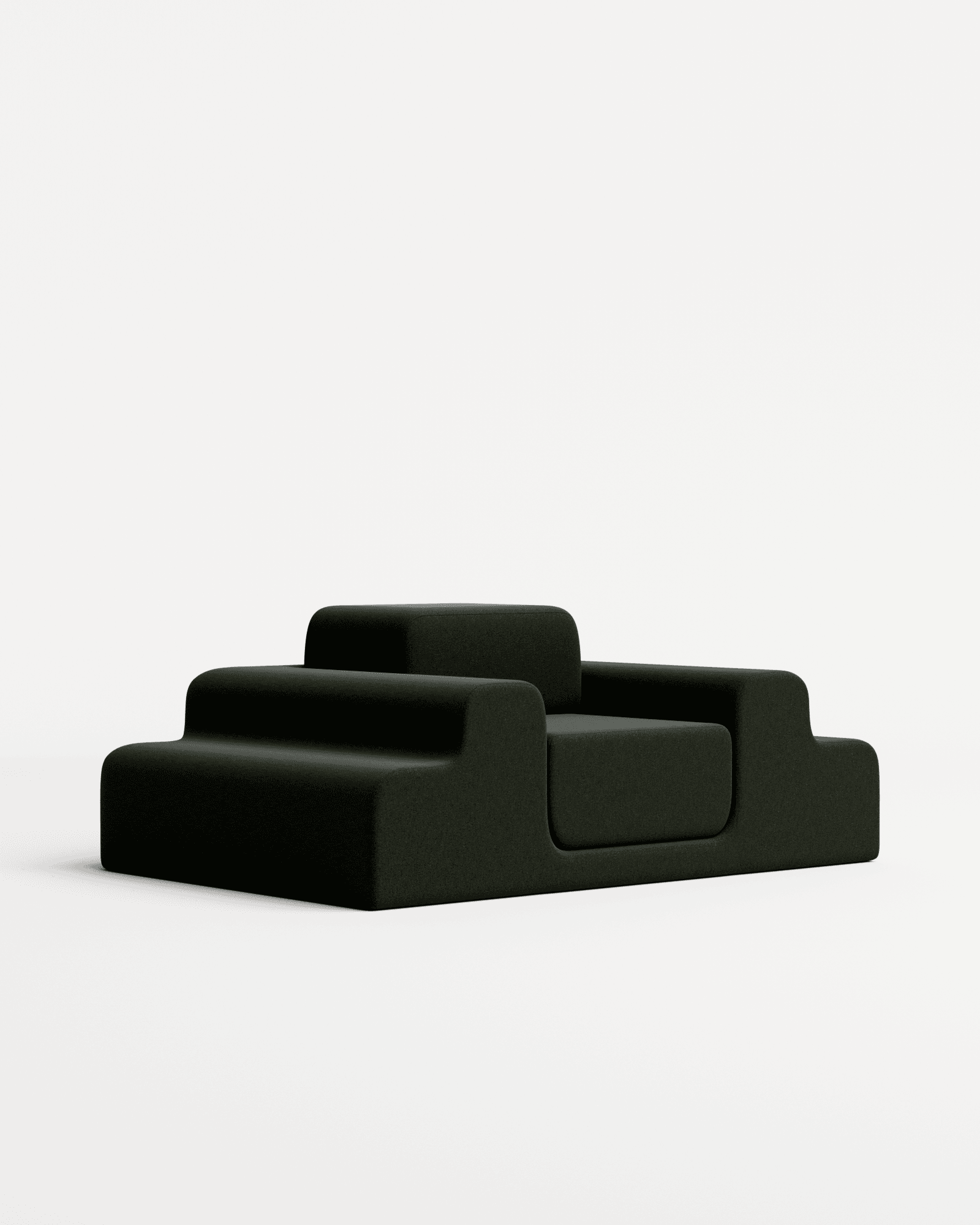 Médano lounge chair in velvet by Estudio Persona, multi-tiered low-slung seating in deep forest green velvet