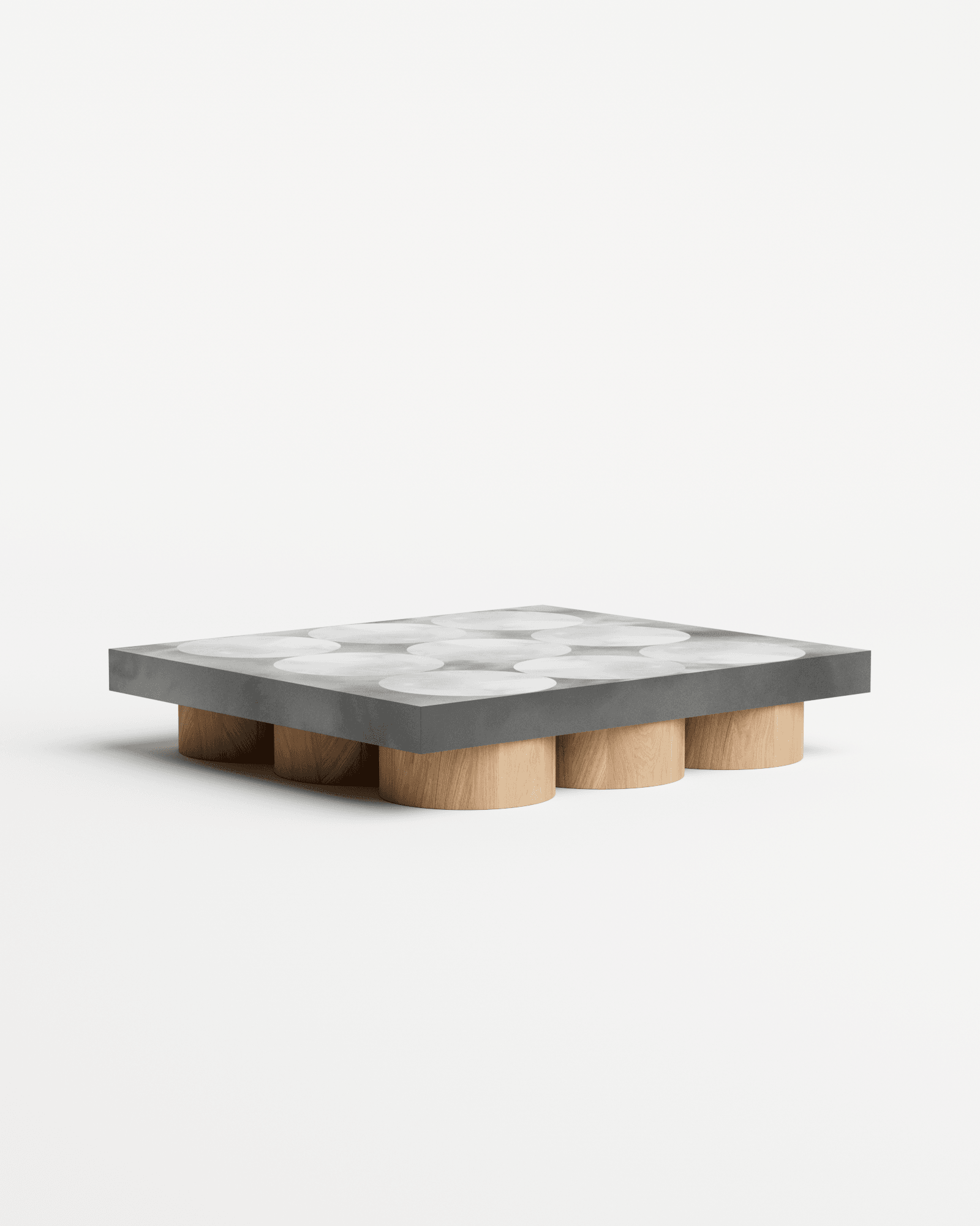 Slab L coffee table by Benni Allan – dark steel top with translucent circle pattern on natural oak legs