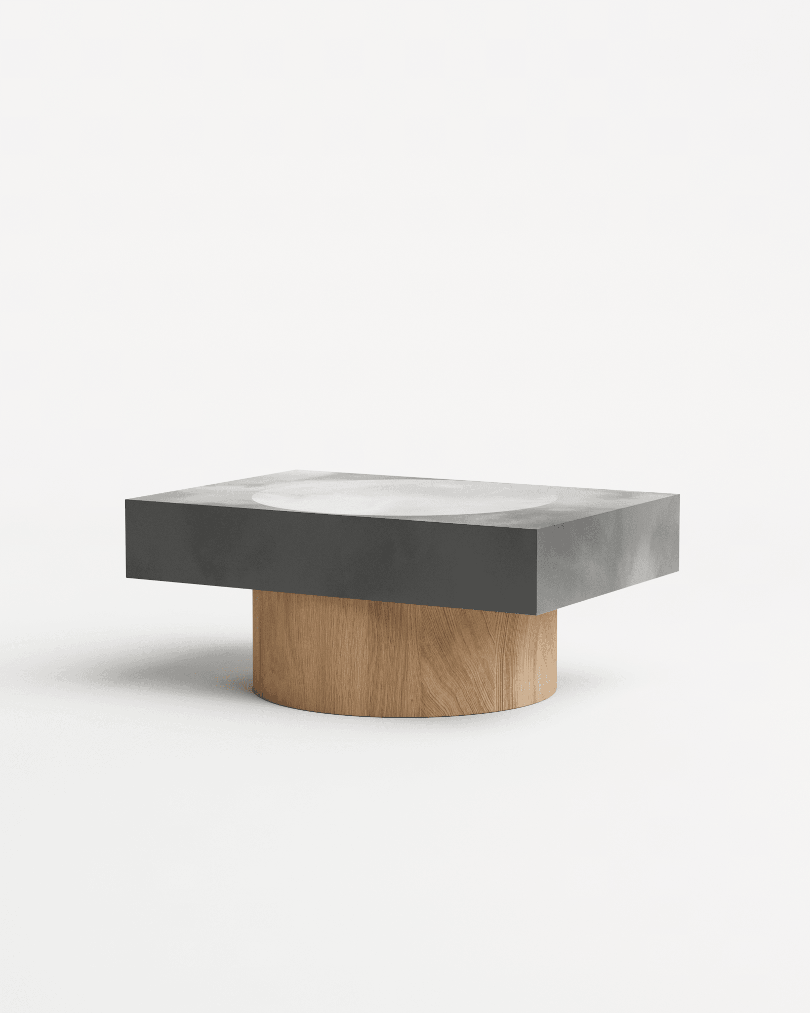 Slab S coffee table by Benni Allan – dark textured top with white recessed basin on single cylindrical oak base
