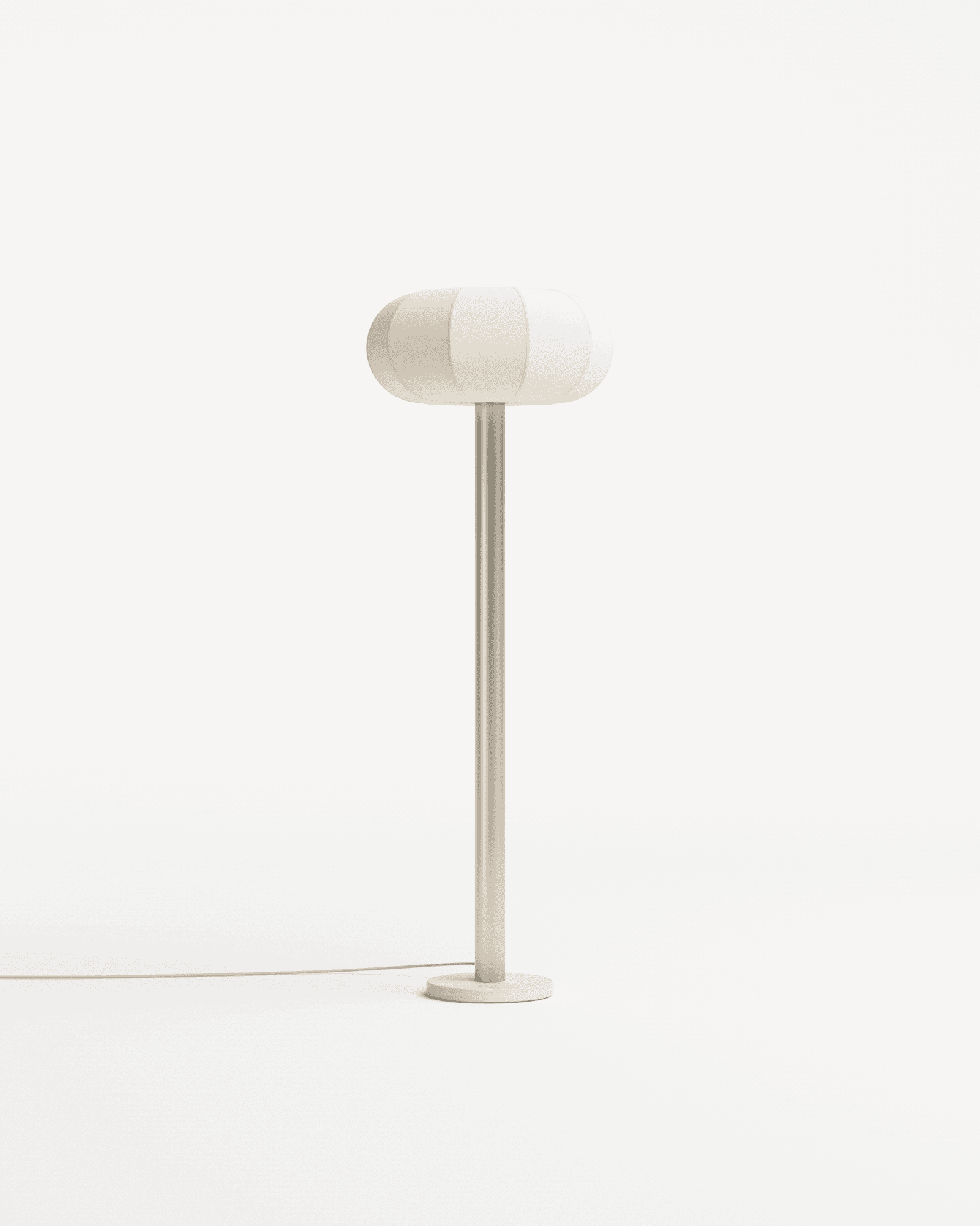 Stellata floor lamp by François Bazin – oblong ribbed off-white textile shade on brushed steel stem with concrete base