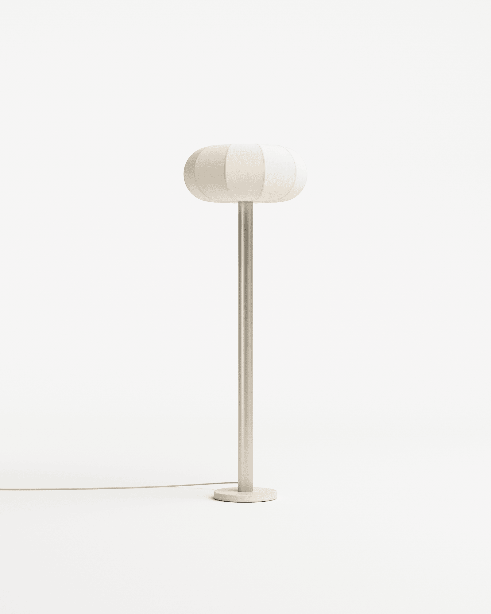 Stellata floor lamp by François Bazin – oblong ribbed off-white textile shade on brushed steel stem with concrete base