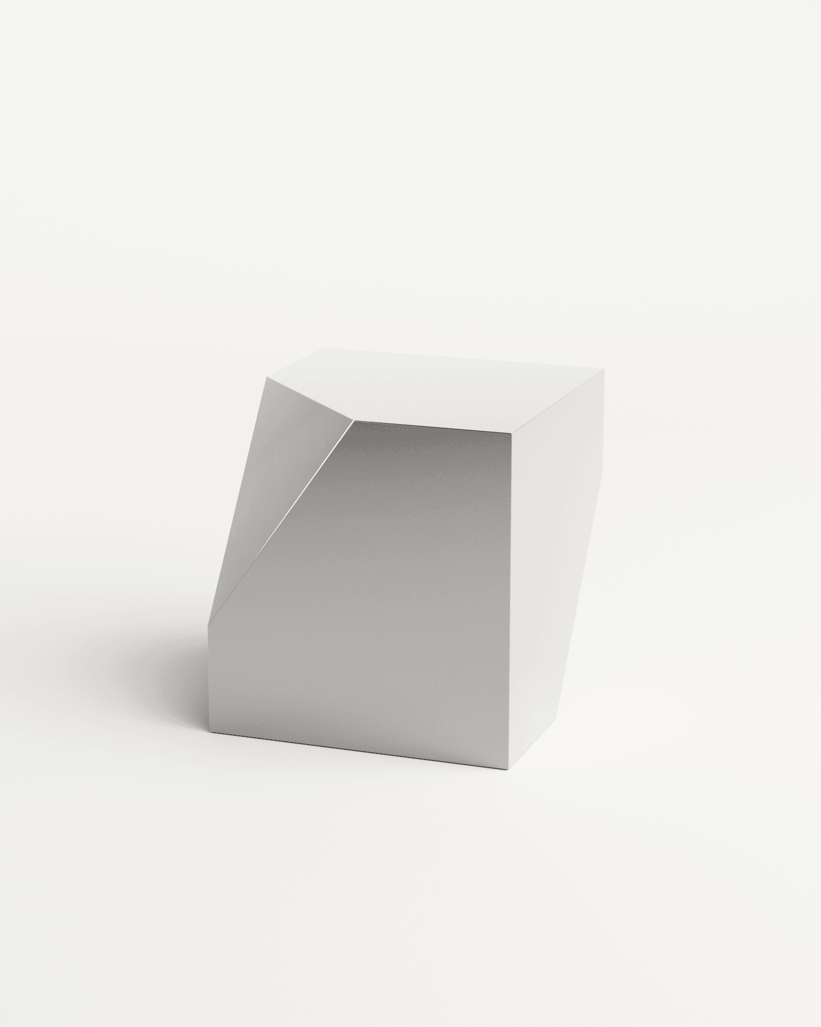 Bevel Side Table chrome mirror by HADGE - asymmetric geometric steel block in matte white and mirror grey