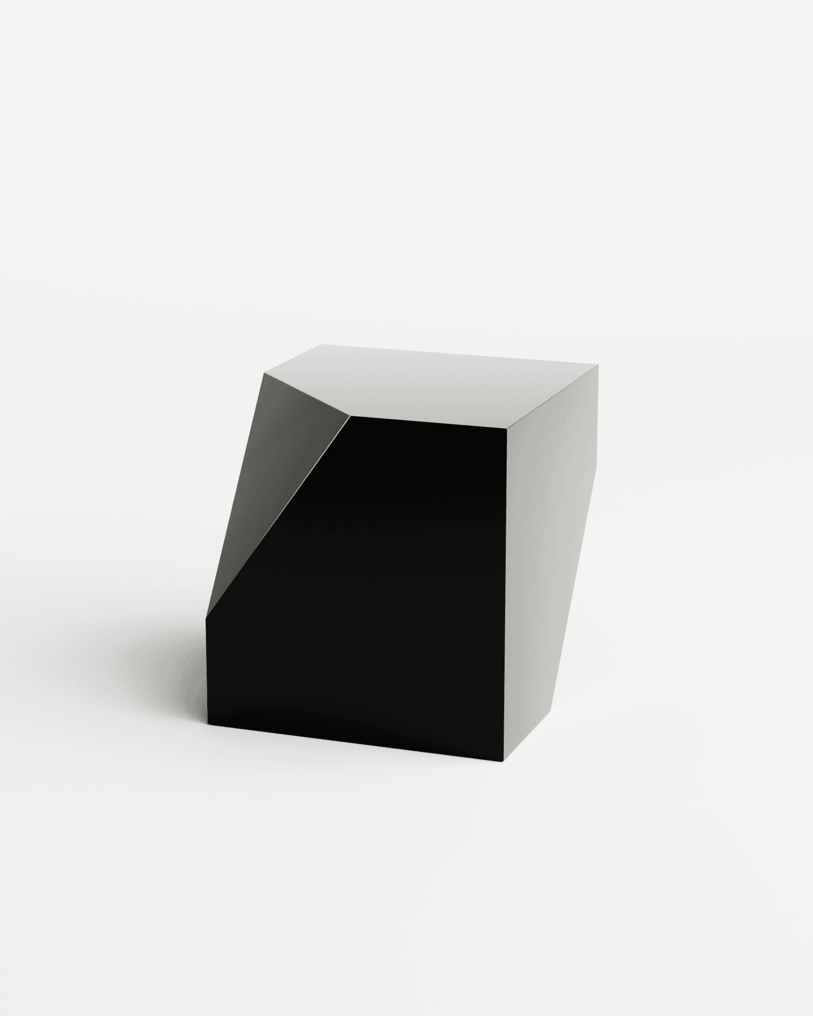 Bevel Side Table chrome mirror black by HADGE - sculptural high-gloss black faceted steel block with sharp angular geometry