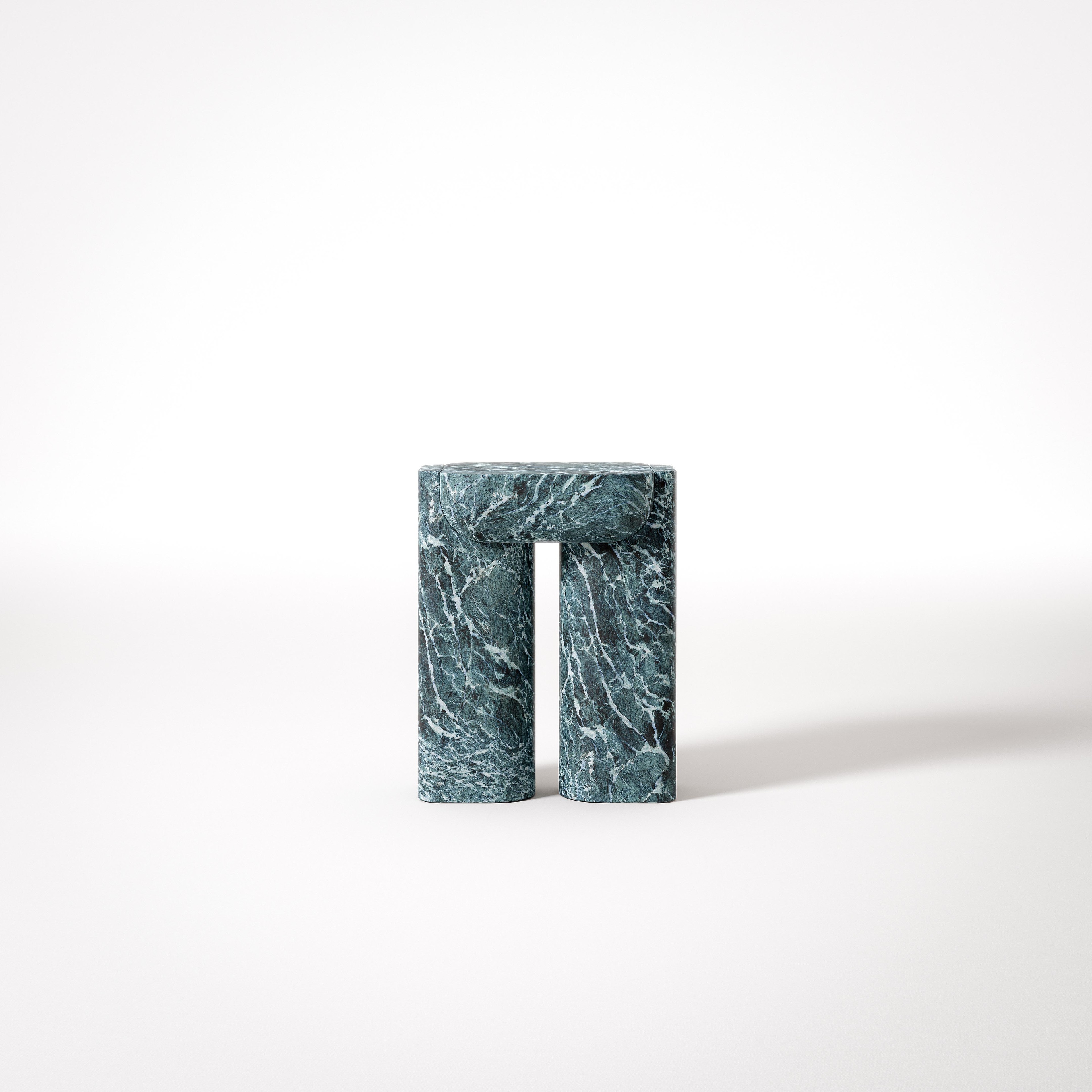 Nova side table by Giulio Zizzari – dark green marble with white veining and concave top recess, Urano